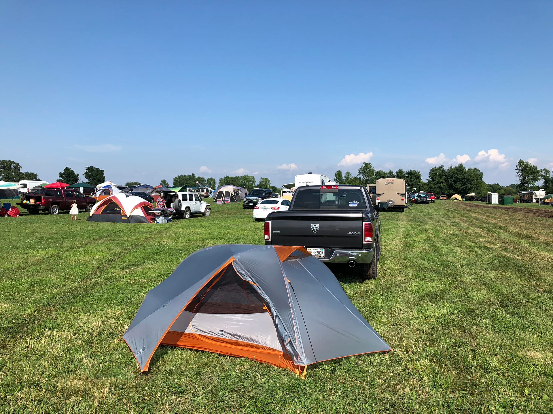 My small REI tent behind my truck - campsite for Oshkosh 2018.
